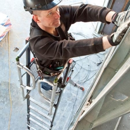 Compact Dual Safety Ladder with Enclosed Work Platform