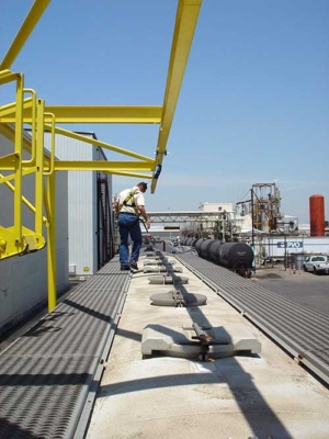 Outdoor freestanding fall arrest anchor systems